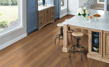 medium toned wood look vinyl flooring in kitchen